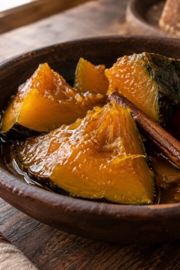 Cooked squash wedges in piloncillo syrup with Mexican cinnamon