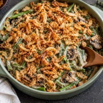Green bean casserole with fresh beans, mushroom cream sauce, and crispy onions